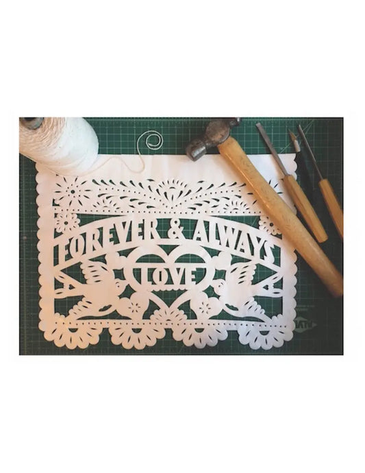 history of papel picado, handmade papel picado with hammers and chisels