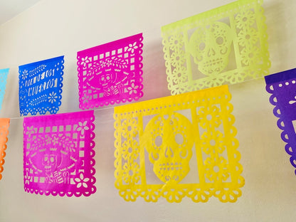 Blue, magenta, yellow and lime green papel picado banner